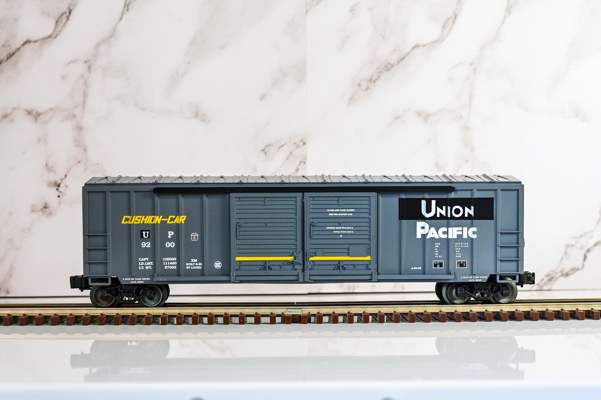 Lionel Southern Pacific / Union Pacific Merger Double Door Boxcar w/ Auto Frames | O Scale