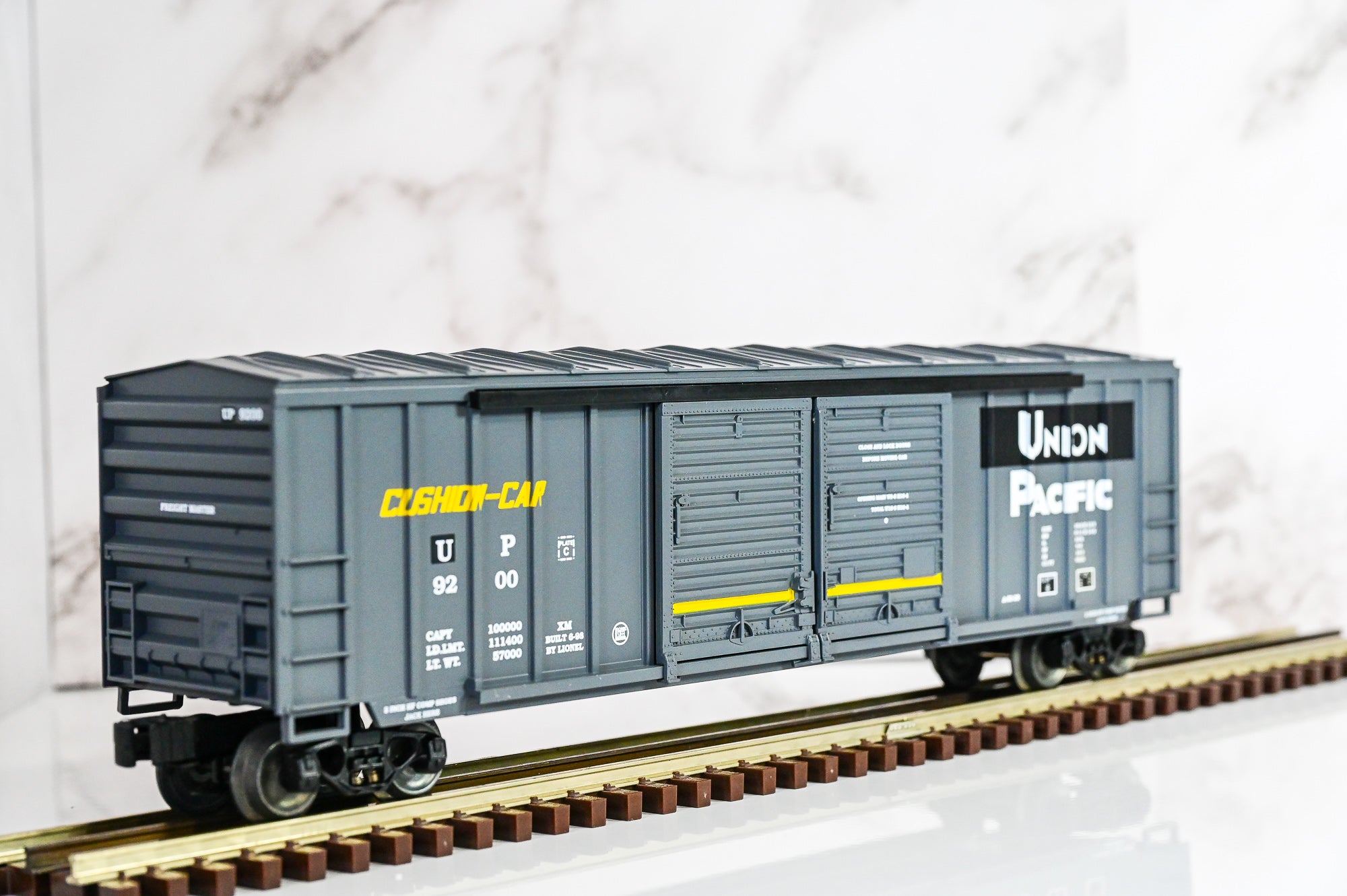 Lionel Southern Pacific / Union Pacific Merger Double Door Boxcar w/ Auto Frames | O Scale