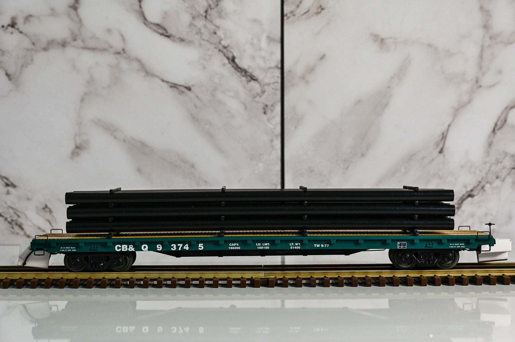 MTH Burlington 60' Flat Car w/Pipe Load #93745 | O Scale
