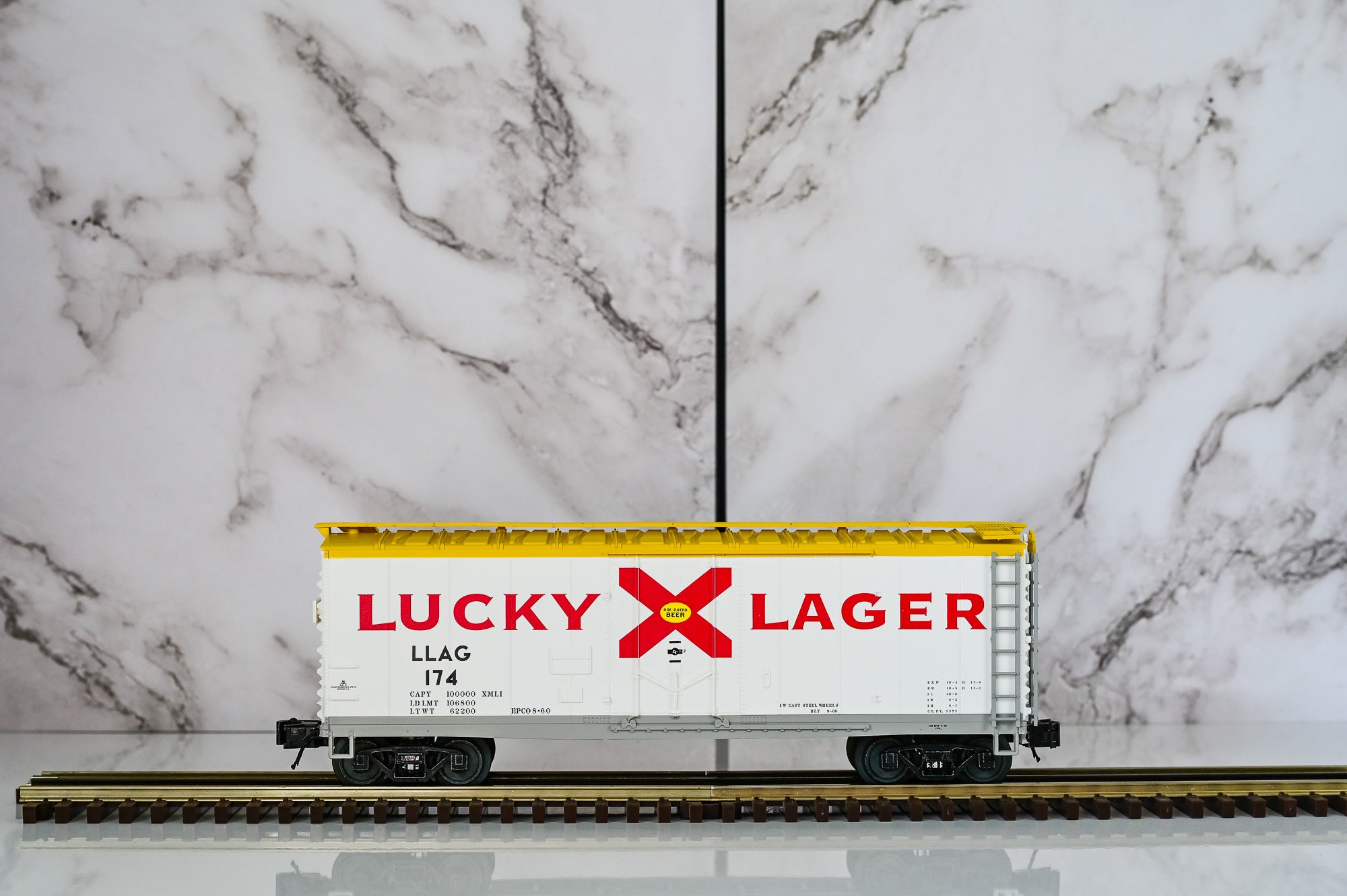 Atlas Trainman 40′ Plug Door Boxcar – Lucky Lager | O Scale