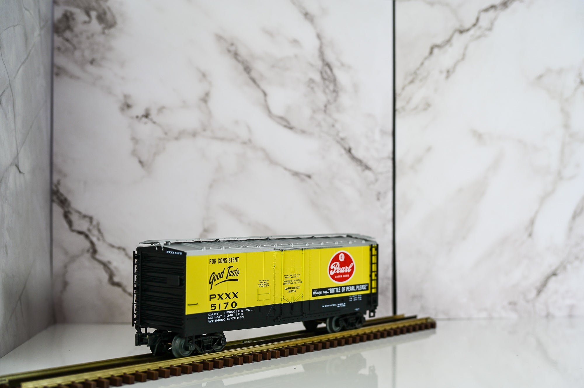 Atlas Trainman 40′ Plug Door Boxcar – Pearl Lager | O Scale