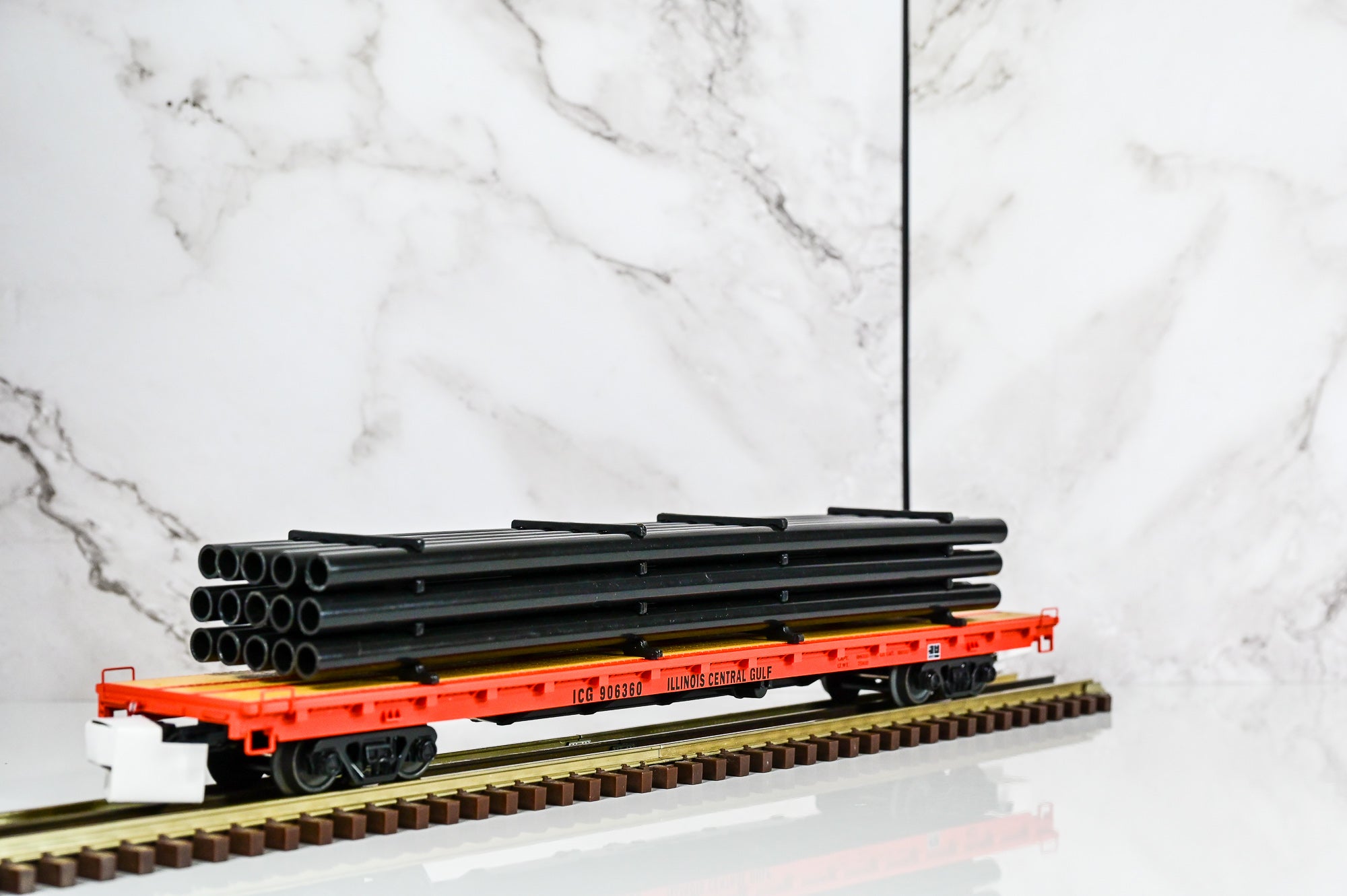 MTH Illinois Central Gulf 60' Flat Car w/Pipe Load  #906360 | O Scale