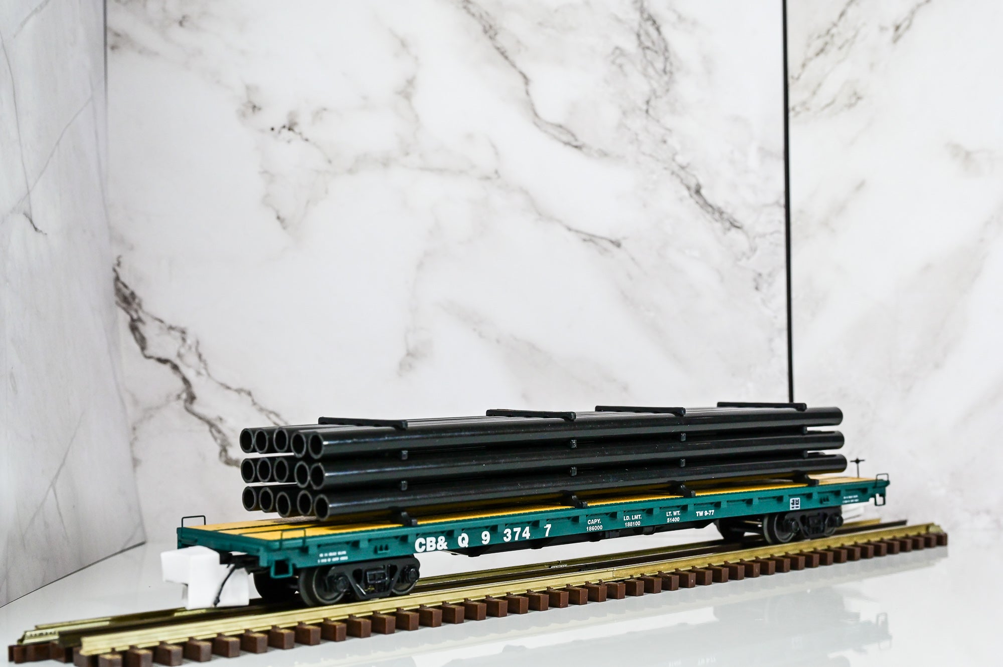 MTH Burlington 60' Flat Car w/Pipe Load  #93747| O Scale