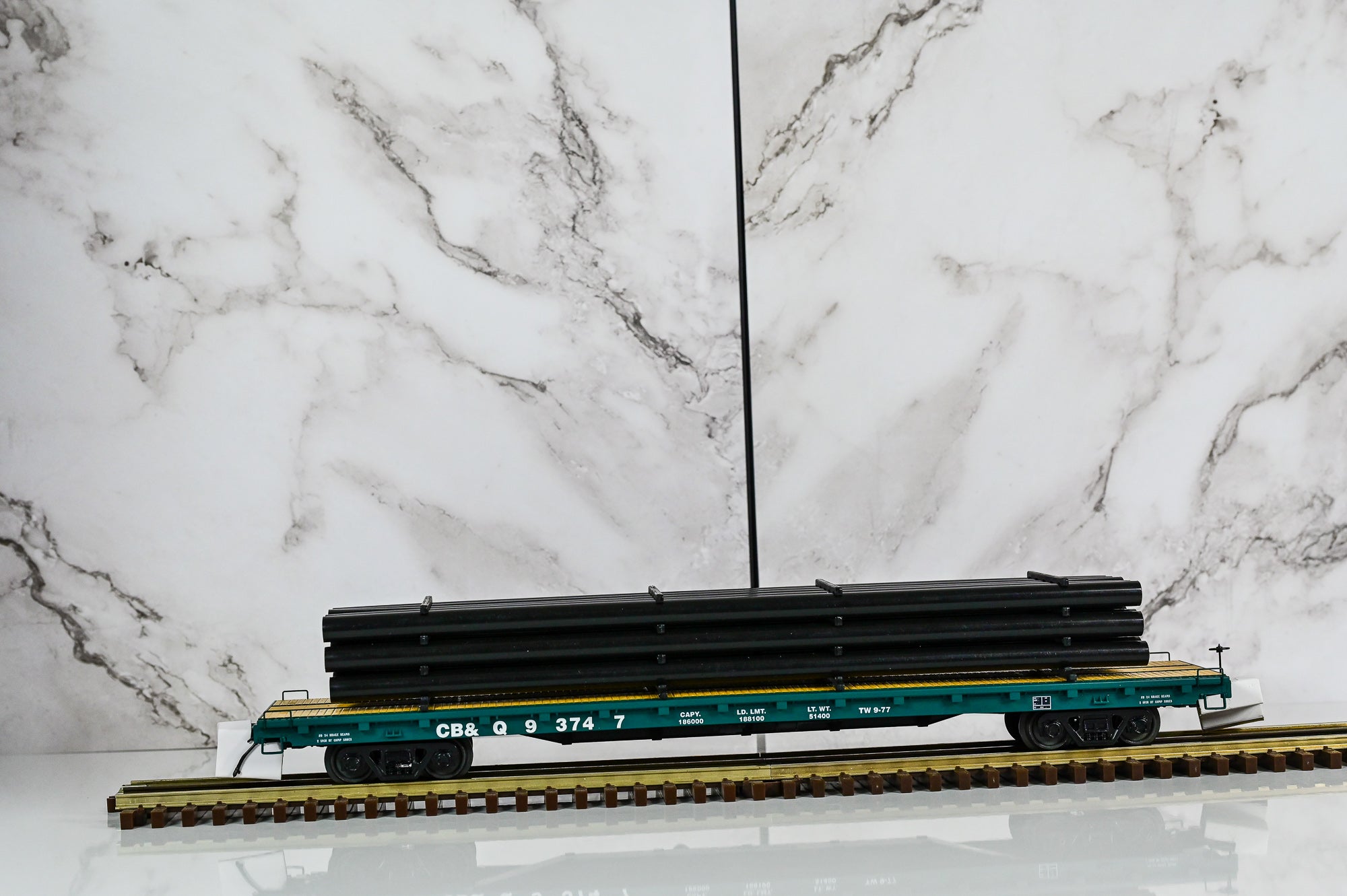 MTH Burlington 60' Flat Car w/Pipe Load  #93747| O Scale