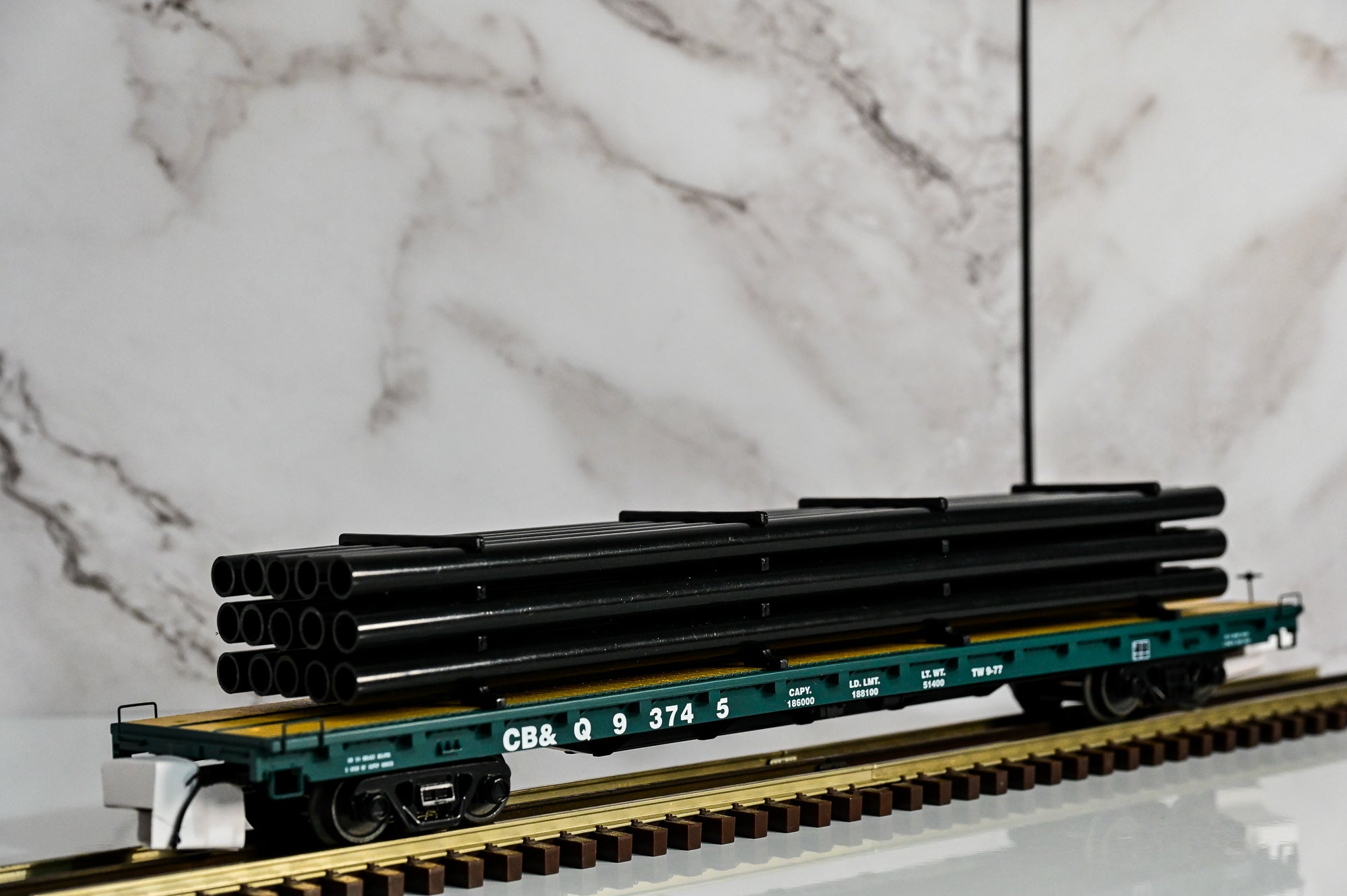 MTH Burlington 60' Flat Car w/Pipe Load #93745 | O Scale